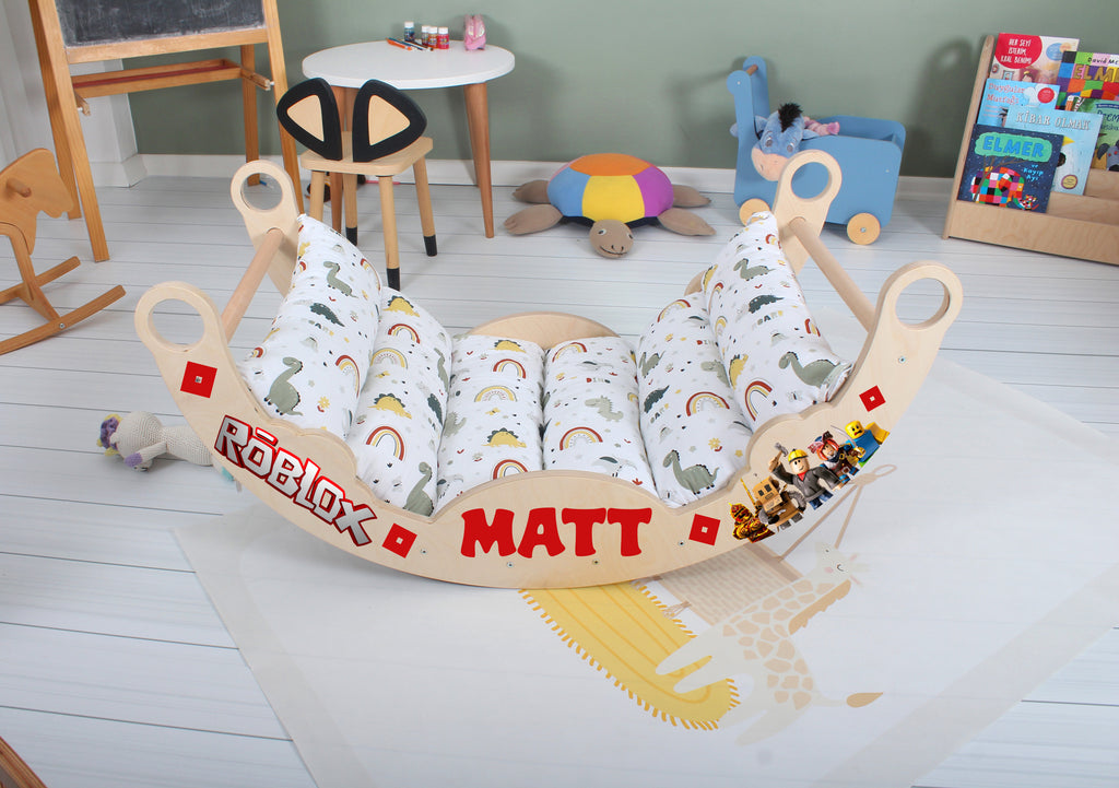a baby bed with a toy train in the middle of it