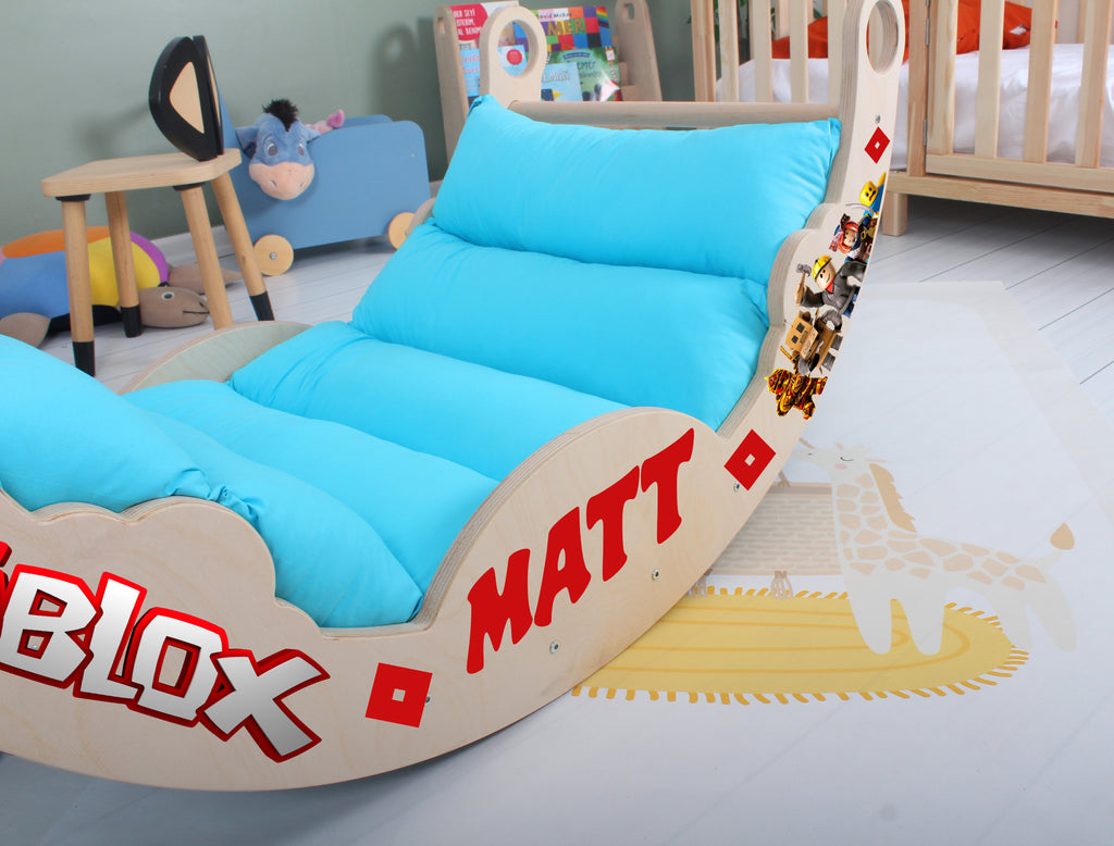 a kid's room with a bed and toys on the floor