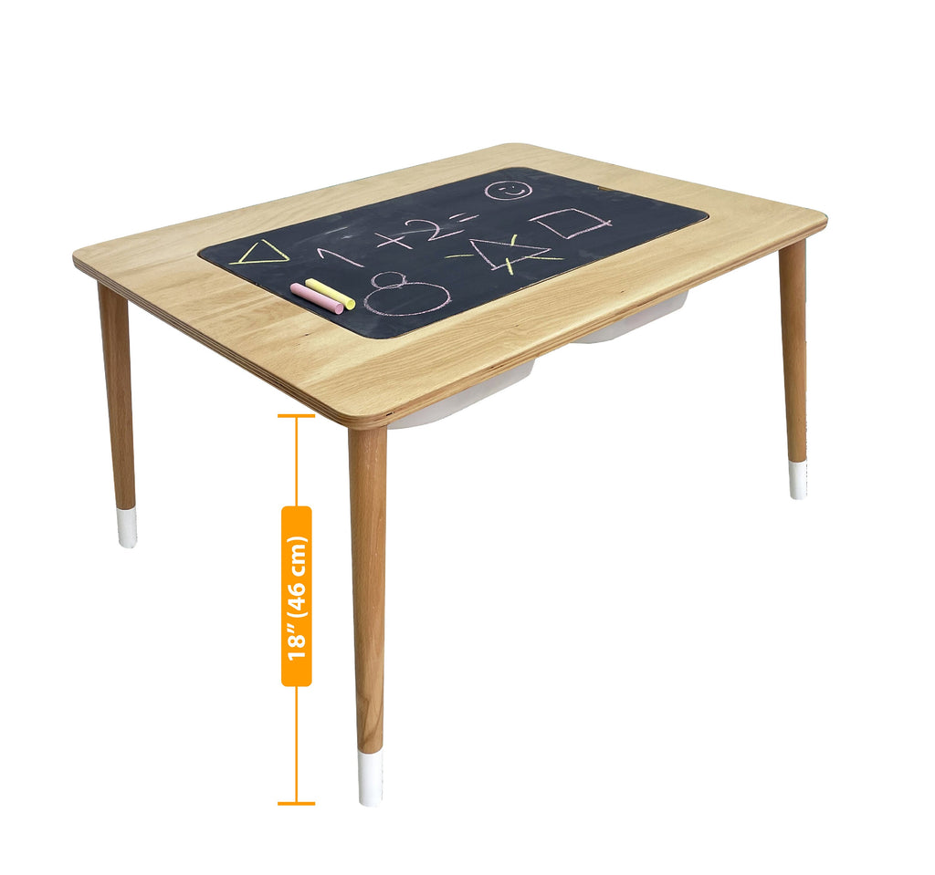 a wooden table with a chalkboard on top of it